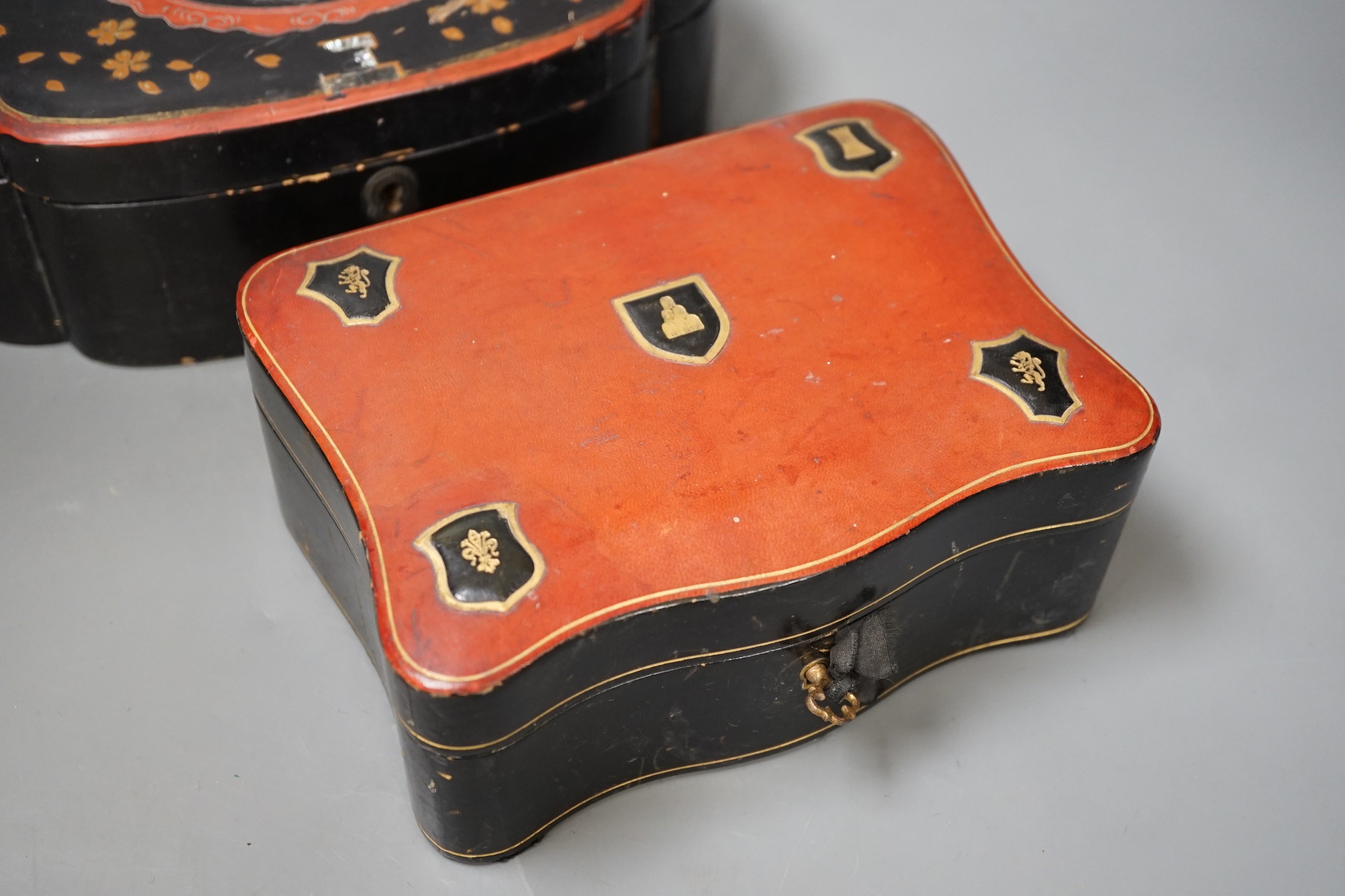 A French leather mounted serpentine glove box and a Japanese lacquer box. Largest 26.5cm wide